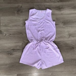 Pink Lily Light Purple romper.